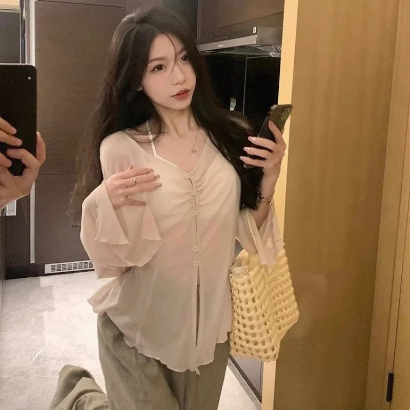 Doorzichtige blouse met wijde  - Blouses recensie en prijs